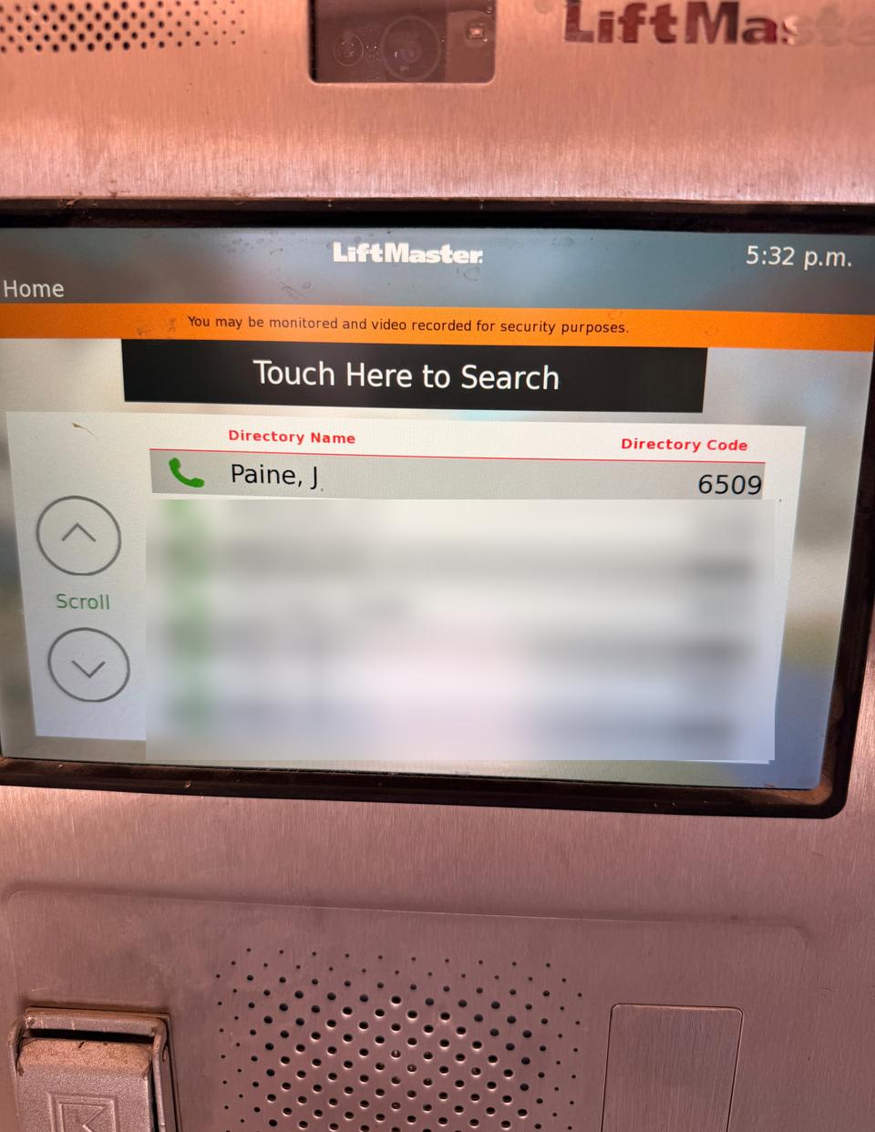 The call box directory screen with Paine, J at the top of the list
